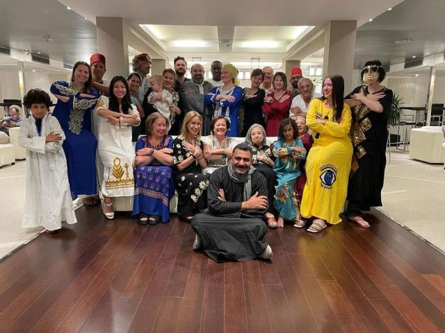 Travelers and our guide at an Egyptian evening in traditional dress